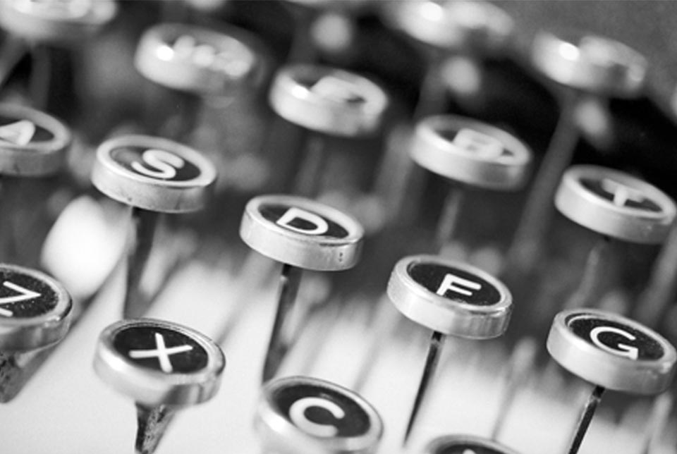 The process of typing a manuscript